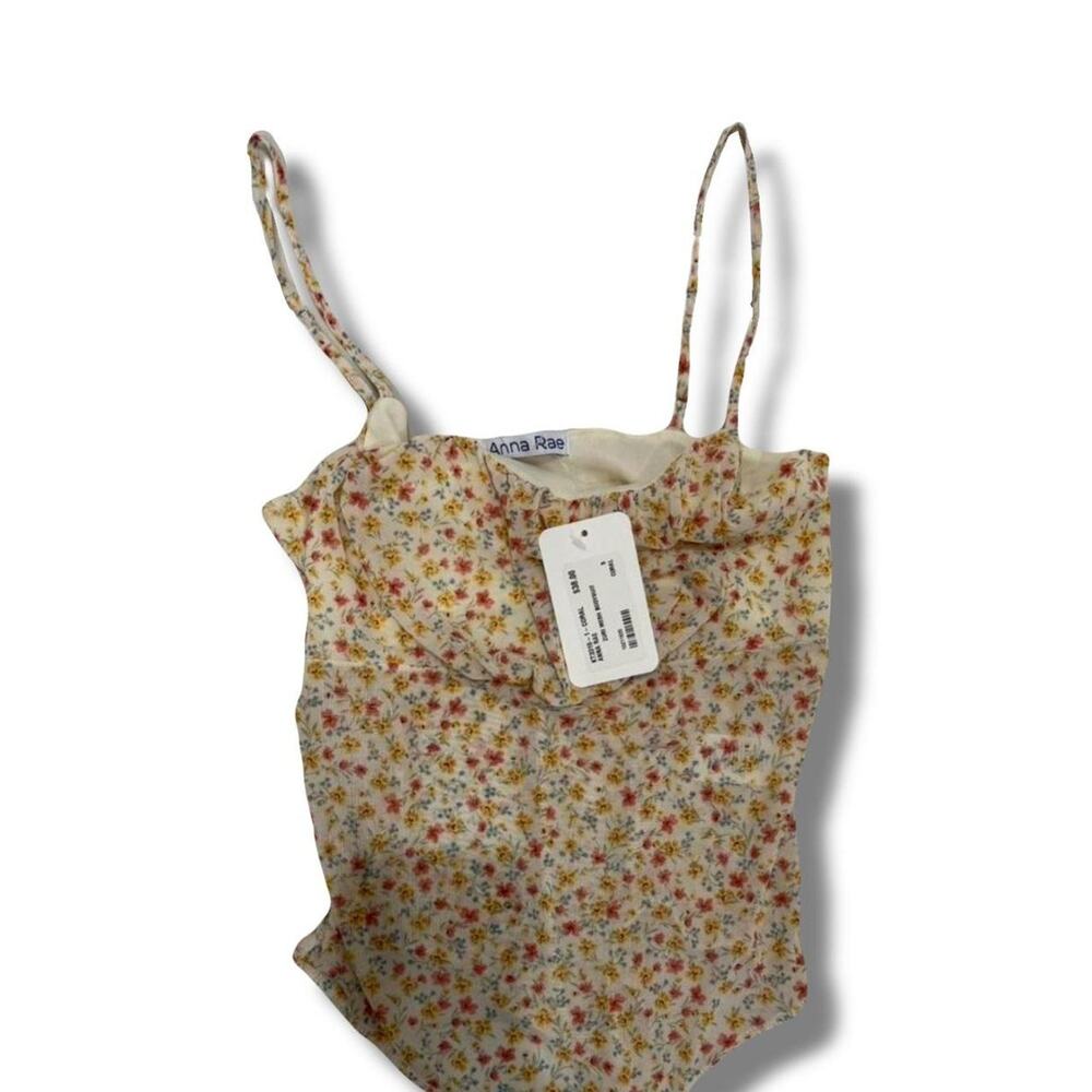 Yellow Anna Rae floral bodysuit size small brand new with tags